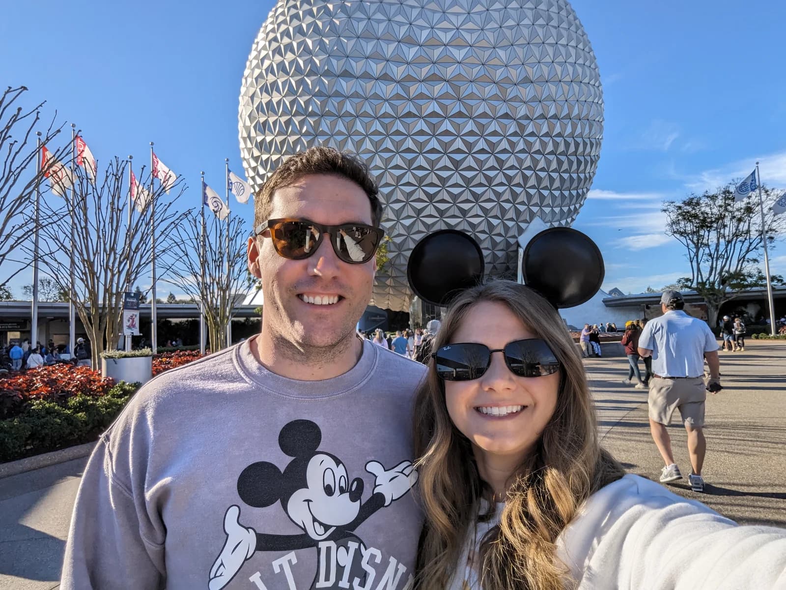 Lanie and Chase together in front of Spaceship Earth at EPCOT
